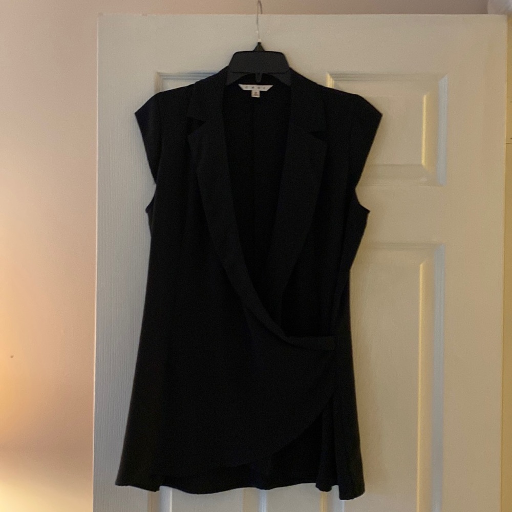 Flattering Cabi top.  Size Small. Wear with or without a top under. 18 in chest